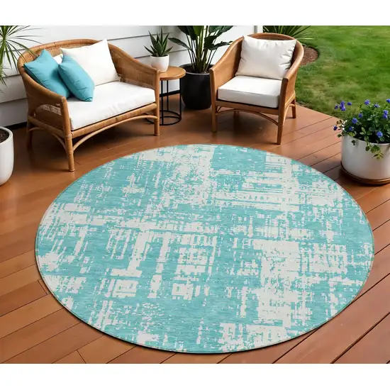8' Aqua And Ivory Round Abstract Washable Indoor Outdoor Area Rug Photo 1