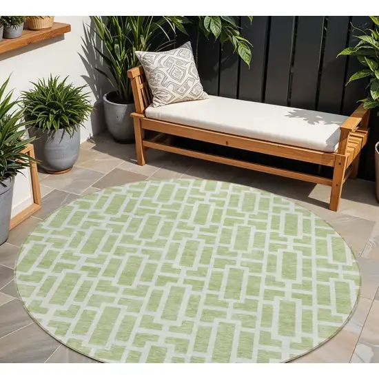 8' Artichoke Green And Ivory Round Geometric Washable Indoor Outdoor Area Rug Photo 1