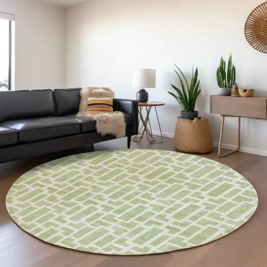 8' Artichoke Green And Ivory Round Geometric Washable Indoor Outdoor Area Rug Photo 6
