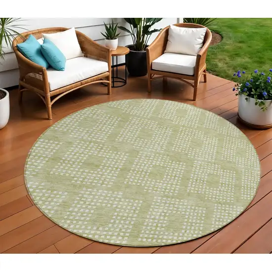 8' Artichoke Green And Ivory Round Geometric Washable Indoor Outdoor Area Rug Photo 1