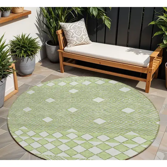 8' Artichoke Green And Ivory Round Geometric Washable Indoor Outdoor Area Rug Photo 1