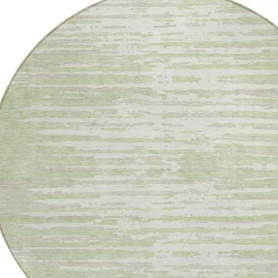 8' Artichoke Green And Ivory Round Striped Washable Indoor Outdoor Area Rug Photo 4