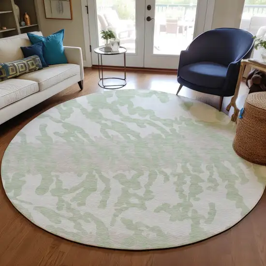 8' Artichoke Green Beige And Ivory Round Animal Print Washable Indoor Outdoor Area Rug Photo 7
