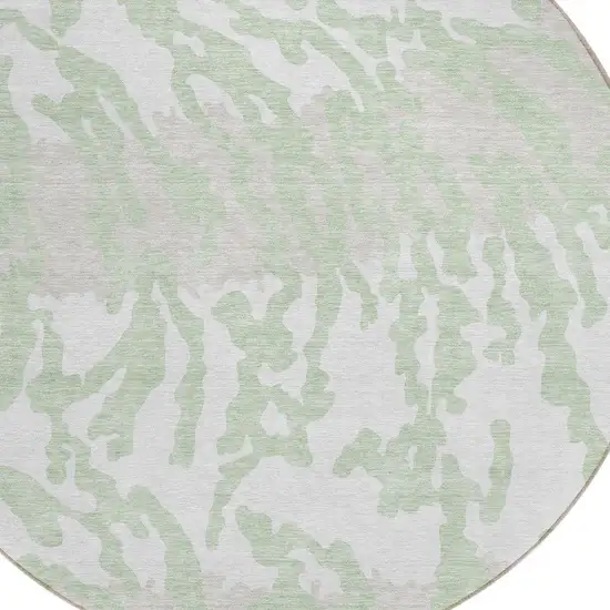 8' Artichoke Green Beige And Ivory Round Animal Print Washable Indoor Outdoor Area Rug Photo 4