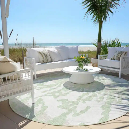 8' Artichoke Green Beige And Ivory Round Animal Print Washable Indoor Outdoor Area Rug Photo 6