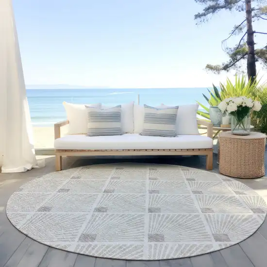 8' Beige And Ivory Round Geometric Washable Indoor Outdoor Area Rug Photo 7