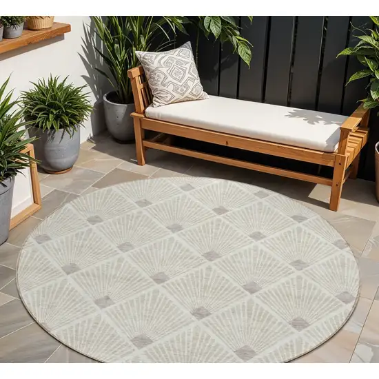 8' Beige And Ivory Round Geometric Washable Indoor Outdoor Area Rug Photo 1