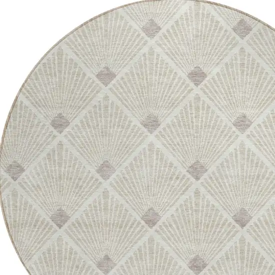 8' Beige And Ivory Round Geometric Washable Indoor Outdoor Area Rug Photo 4