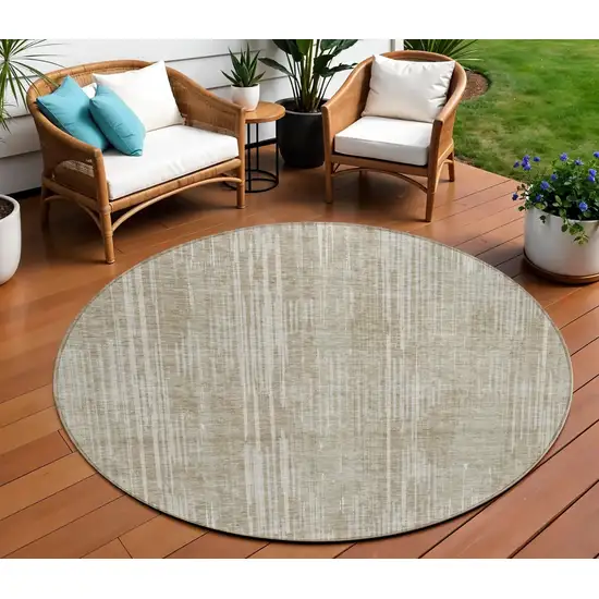 8' Beige And Ivory Round Striped Washable Indoor Outdoor Area Rug Photo 1
