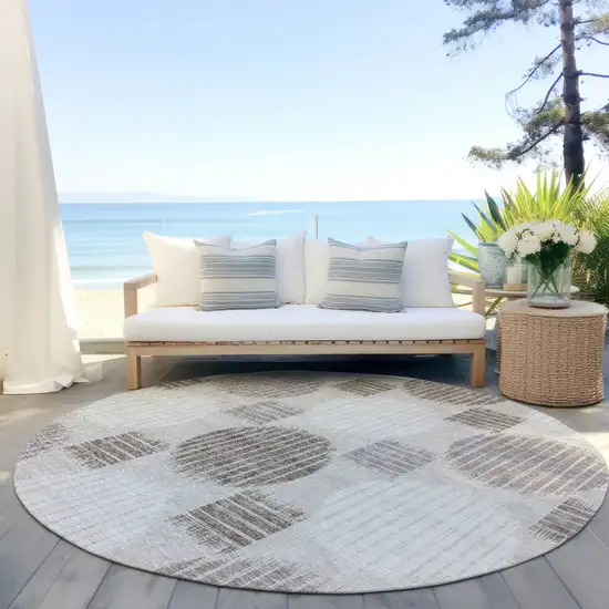 8' Beige Brown And Ivory Round Geometric Washable Indoor Outdoor Area Rug Photo 6