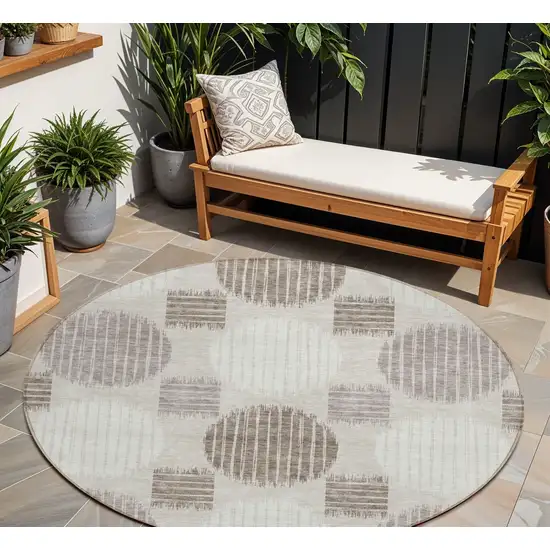 8' Beige Brown And Ivory Round Geometric Washable Indoor Outdoor Area Rug Photo 1