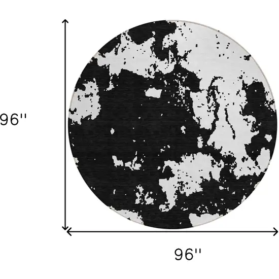 8' Black And Ivory Round Abstract Washable Indoor Outdoor Area Rug Photo 3