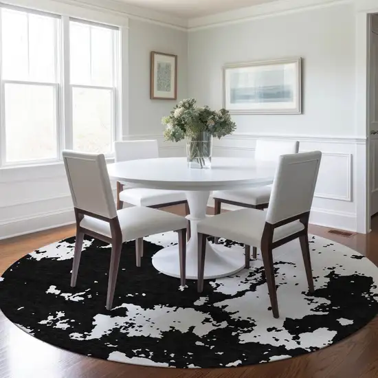 8' Black And Ivory Round Abstract Washable Indoor Outdoor Area Rug Photo 7