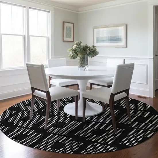 8' Black And Ivory Round Geometric Washable Indoor Outdoor Area Rug Photo 7