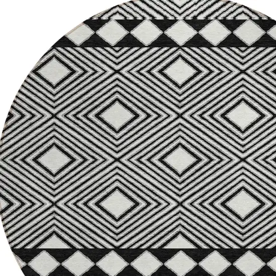 8' Black And Ivory Round Geometric Washable Indoor Outdoor Area Rug Photo 5