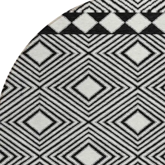 8' Black And Ivory Round Geometric Washable Indoor Outdoor Area Rug Photo 4