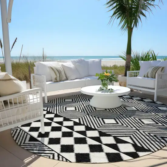 8' Black And Ivory Round Geometric Washable Indoor Outdoor Area Rug Photo 6