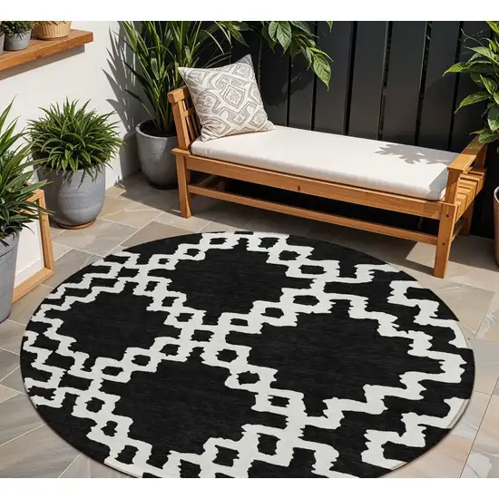 8' Black And Ivory Round Geometric Washable Indoor Outdoor Area Rug Photo 1