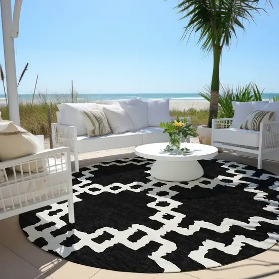 8' Black And Ivory Round Geometric Washable Indoor Outdoor Area Rug Photo 7