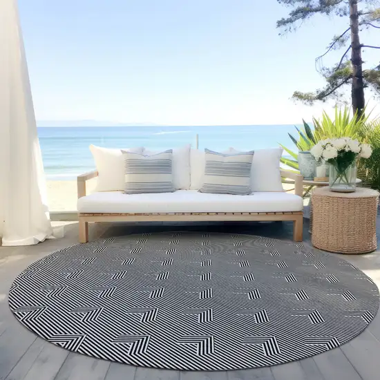 8' Black And Ivory Round Geometric Washable Indoor Outdoor Area Rug Photo 6