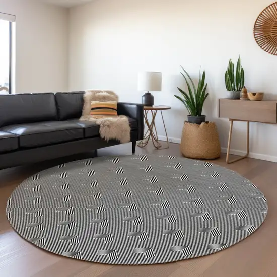 8' Black And Ivory Round Geometric Washable Indoor Outdoor Area Rug Photo 7