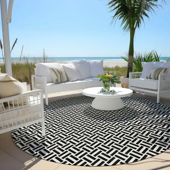 8' Black And Ivory Round Geometric Washable Indoor Outdoor Area Rug Photo 7