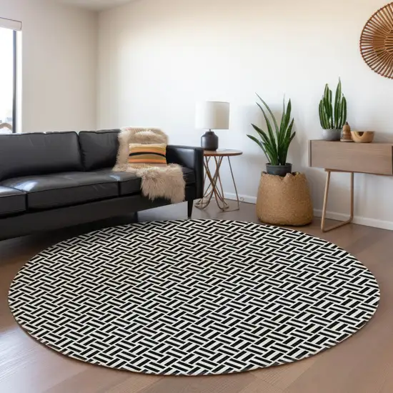 8' Black And Ivory Round Geometric Washable Indoor Outdoor Area Rug Photo 8