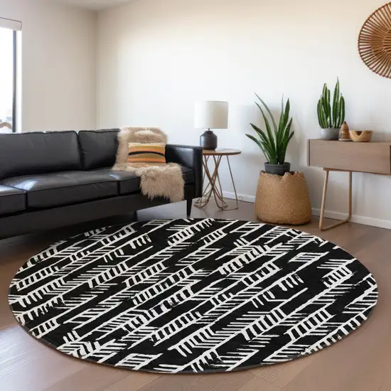 8' Black And Ivory Round Tribal Washable Indoor Outdoor Area Rug Photo 7