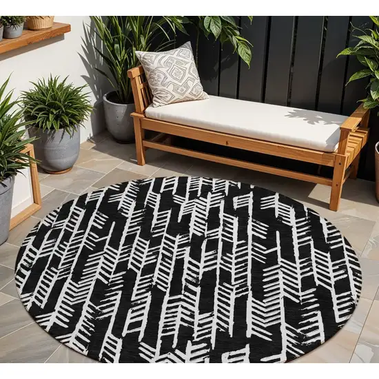 8' Black And Ivory Round Tribal Washable Indoor Outdoor Area Rug Photo 1