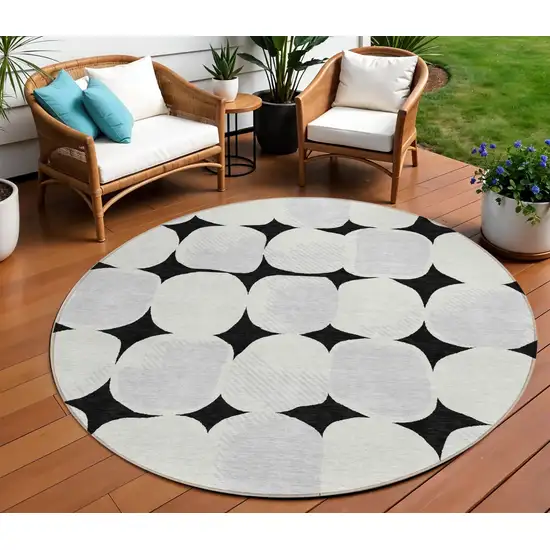 8' Black Gray And Ivory Round Abstract Washable Indoor Outdoor Area Rug Photo 1