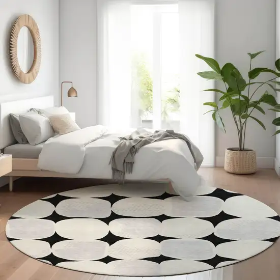8' Black Gray And Ivory Round Abstract Washable Indoor Outdoor Area Rug Photo 8