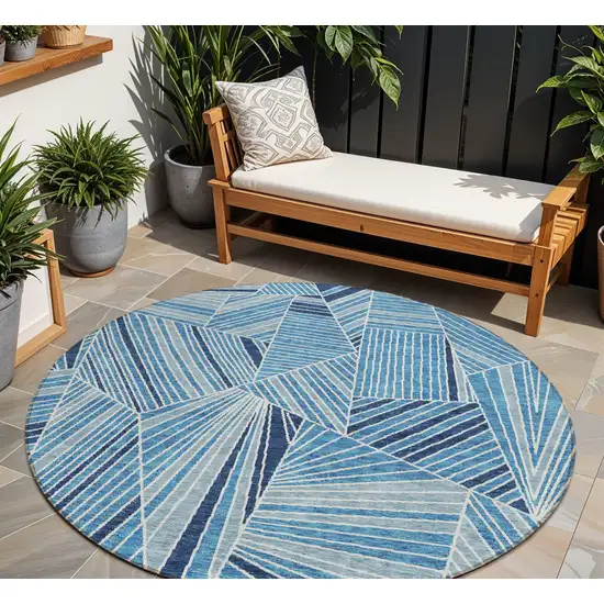 8' Blue And Teal Blue Round Geometric Washable Indoor Outdoor Area Rug Photo 1