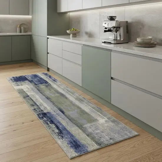 8' Blue Green And Ivory Abstract Power Loom Distressed Runner Rug Photo 1