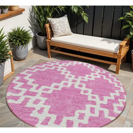 8' Blush And Ivory Round Geometric Washable Indoor Outdoor Area Rug Photo 1