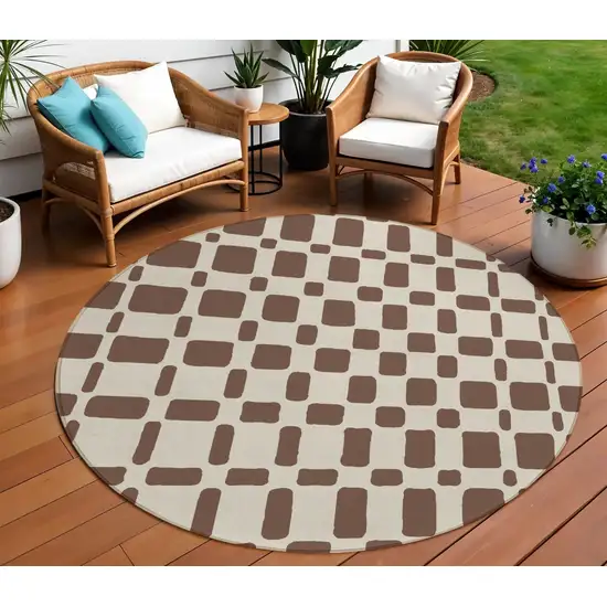 8' Brown And Beige Round Geometric Washable Indoor Outdoor Area Rug Photo 1