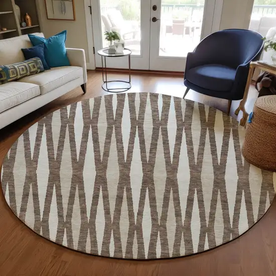 8' Brown And Ivory Round Geometric Washable Indoor Outdoor Area Rug Photo 7