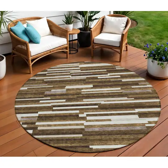 8' Brown And Ivory Round Striped Washable Indoor Outdoor Area Rug Photo 1