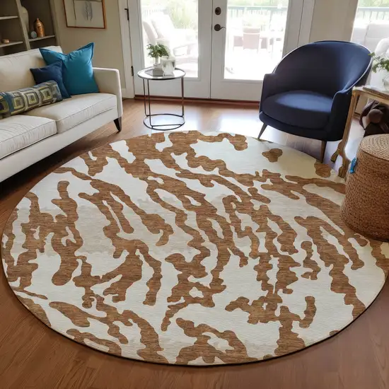 8' Brown Beige And Ivory Round Animal Print Washable Indoor Outdoor Area Rug Photo 7