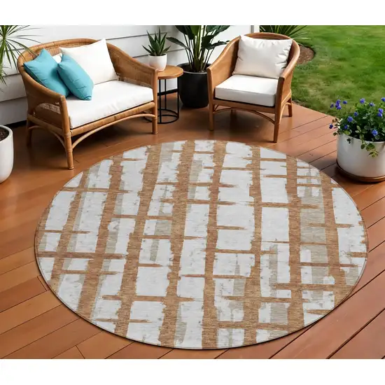 8' Brown Beige And Ivory Round Striped Washable Indoor Outdoor Area Rug Photo 1