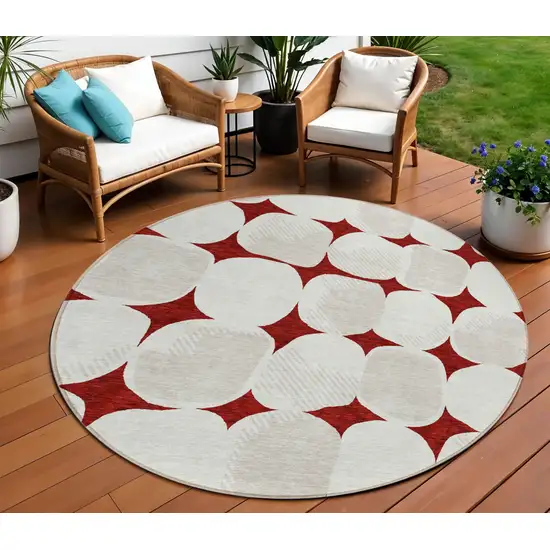 8' Burgundy Beige And Ivory Round Abstract Washable Indoor Outdoor Area Rug Photo 1