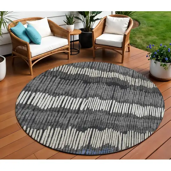 8' Charcoal Blue And Ivory Round Striped Washable Indoor Outdoor Area Rug Photo 1