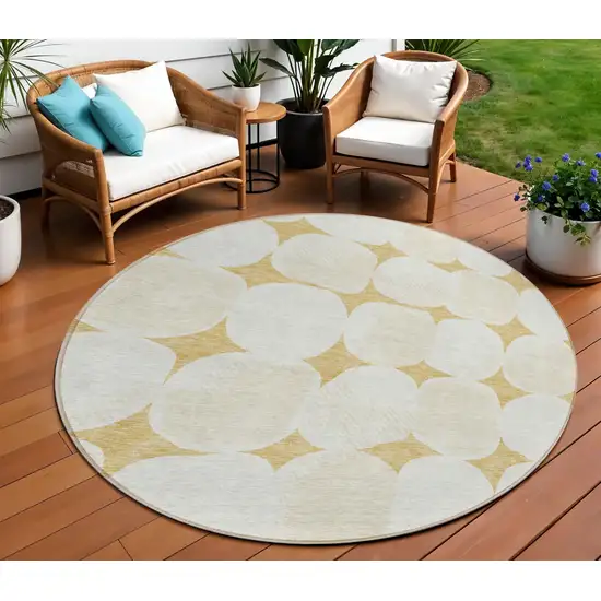8' Gold And Beige Round Abstract Washable Indoor Outdoor Area Rug Photo 1