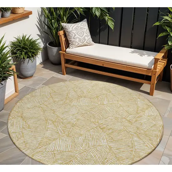 8' Gold And Beige Round Floral Washable Indoor Outdoor Area Rug Photo 1