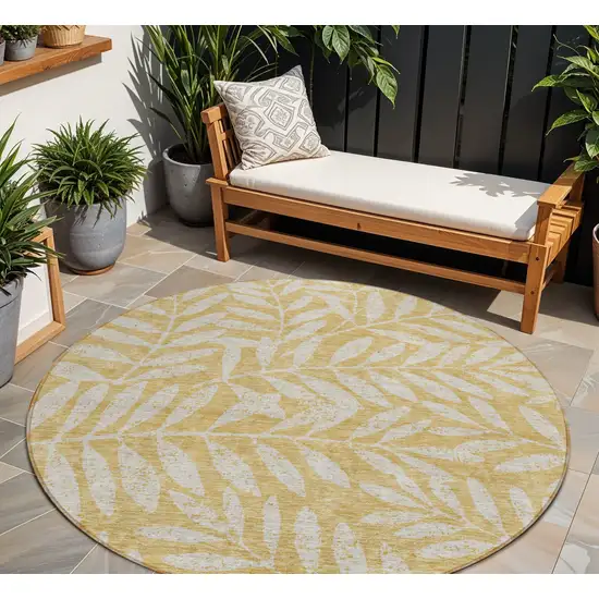 8' Gold And Gray Round Floral Washable Indoor Outdoor Area Rug Photo 1