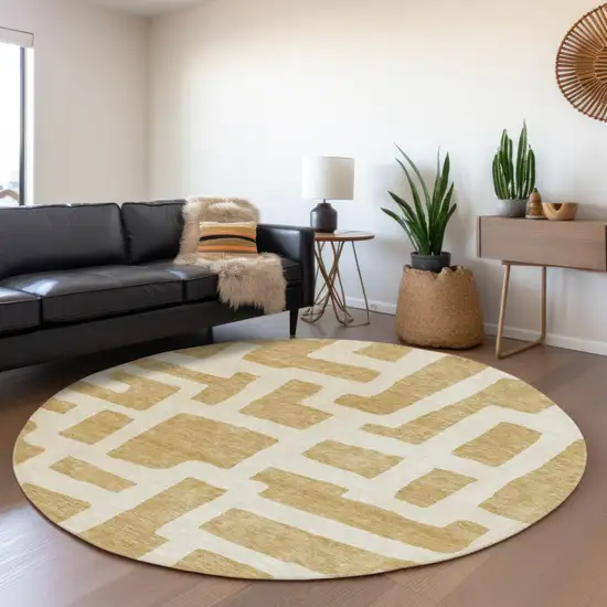 8' Gold And Ivory Round Abstract Washable Indoor Outdoor Area Rug Photo 6