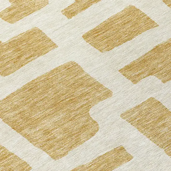 8' Gold And Ivory Round Abstract Washable Indoor Outdoor Area Rug Photo 7