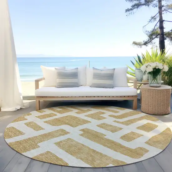 8' Gold And Ivory Round Abstract Washable Indoor Outdoor Area Rug Photo 5