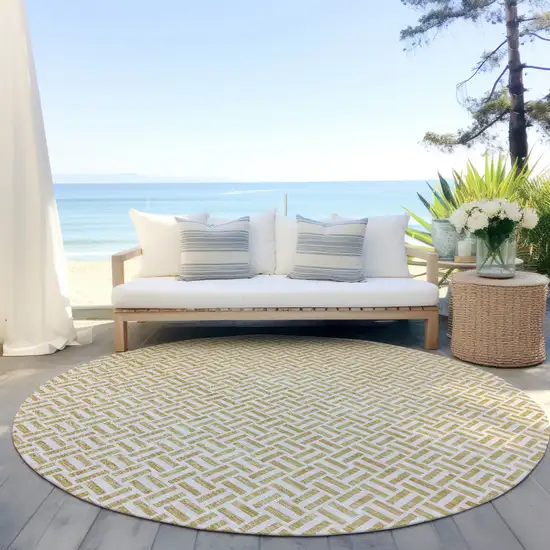 8' Gold And Ivory Round Geometric Washable Indoor Outdoor Area Rug Photo 7