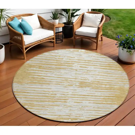 8' Gold Gray And Beige Round Striped Washable Indoor Outdoor Area Rug Photo 1