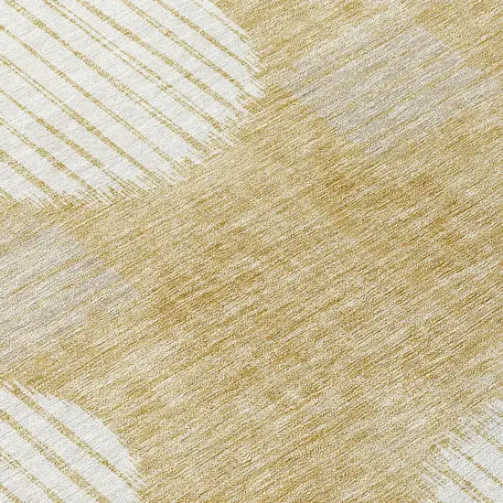 8' Gold Gray And Ivory Round Geometric Washable Indoor Outdoor Area Rug Photo 8